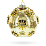 Jeweled Snowflakes Adorning a Golden Glossy Glass Ornament