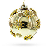 Jeweled Snowflakes Adorning a Golden Glossy Glass Ornament